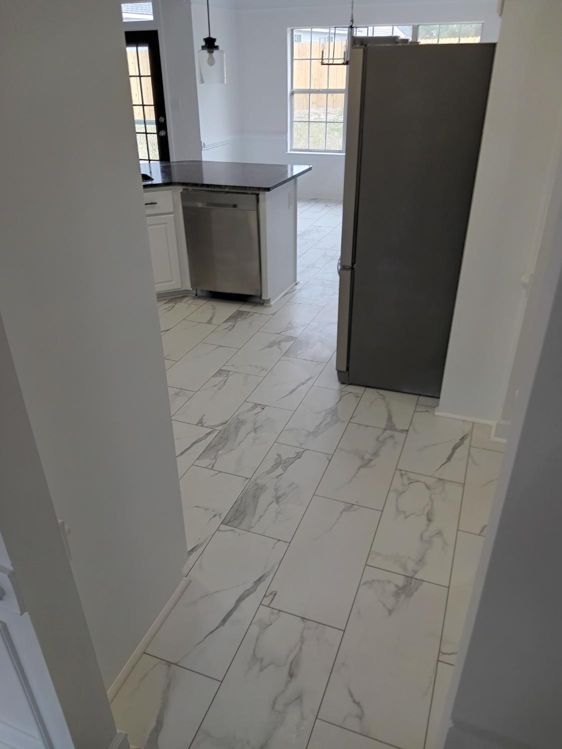 Marble-look tile kitchen install