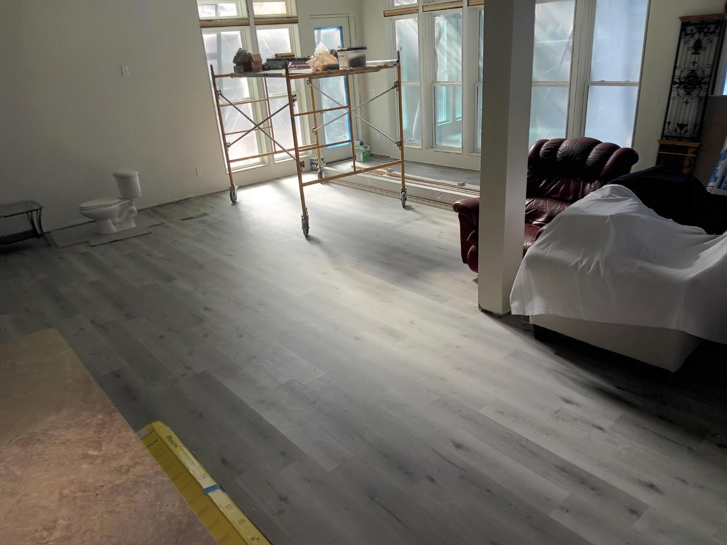 Open room with light gray LVP