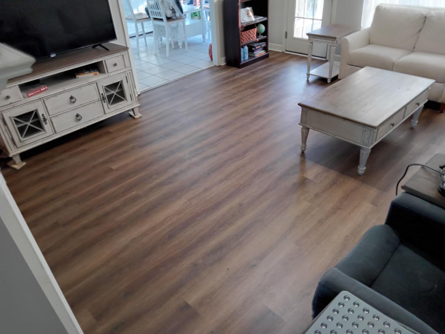 Furnished living room with medium LVP
