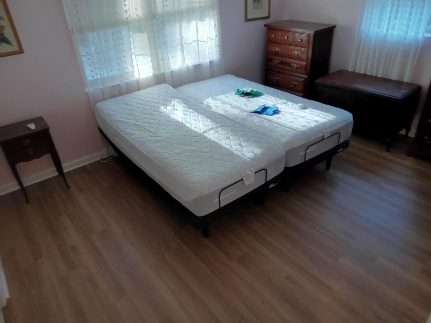 Bedroom with medium wood-look LVP