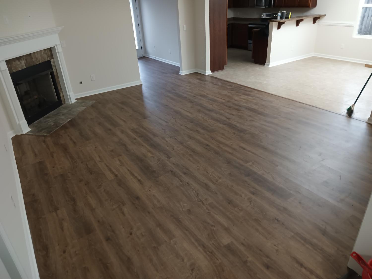 Living to kitchen transition with medium LVP