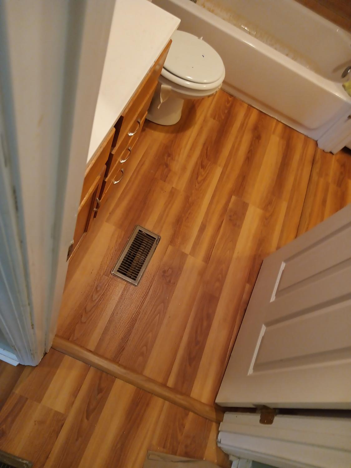 Bathroom wood-look LVP around toilet