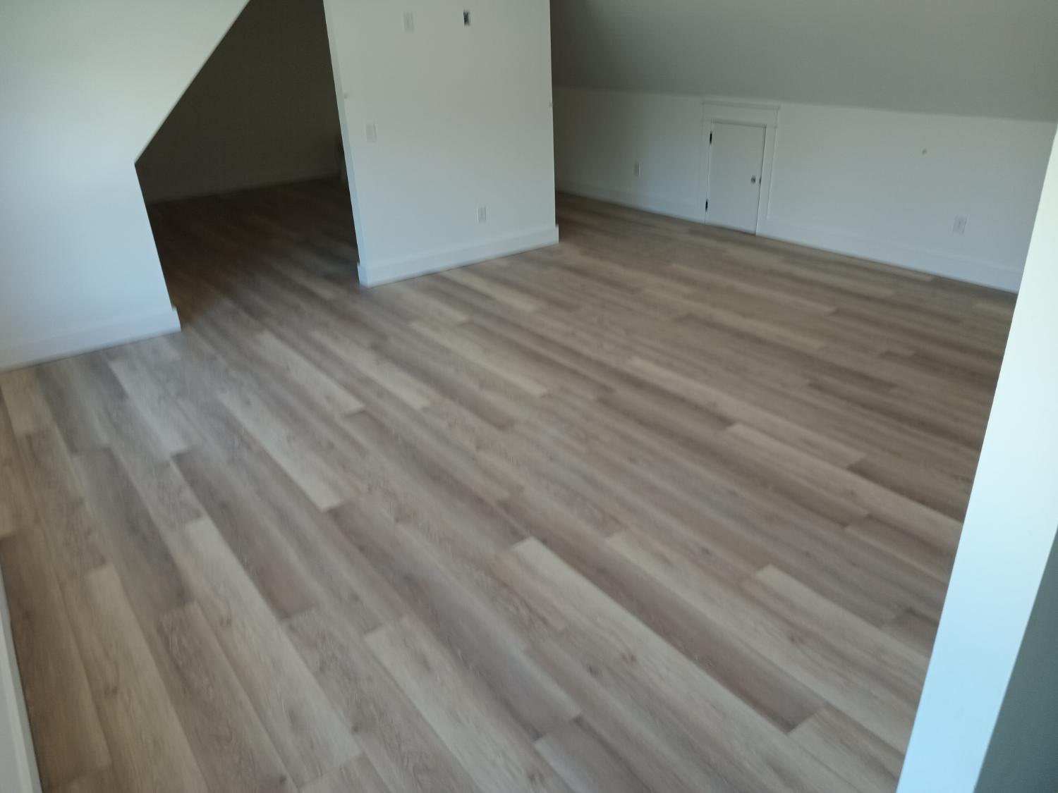 Upstairs open loft with light LVP
